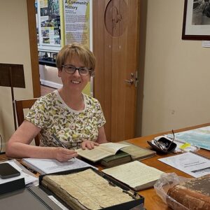 Susan Johnson in the Museum library