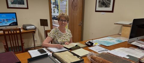 Susan Johnson in the Museum library