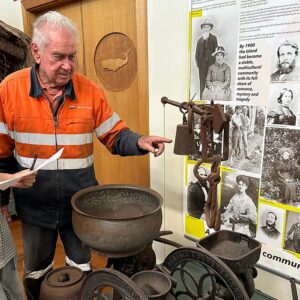 Lise Gardien discussing old farming artefacts
